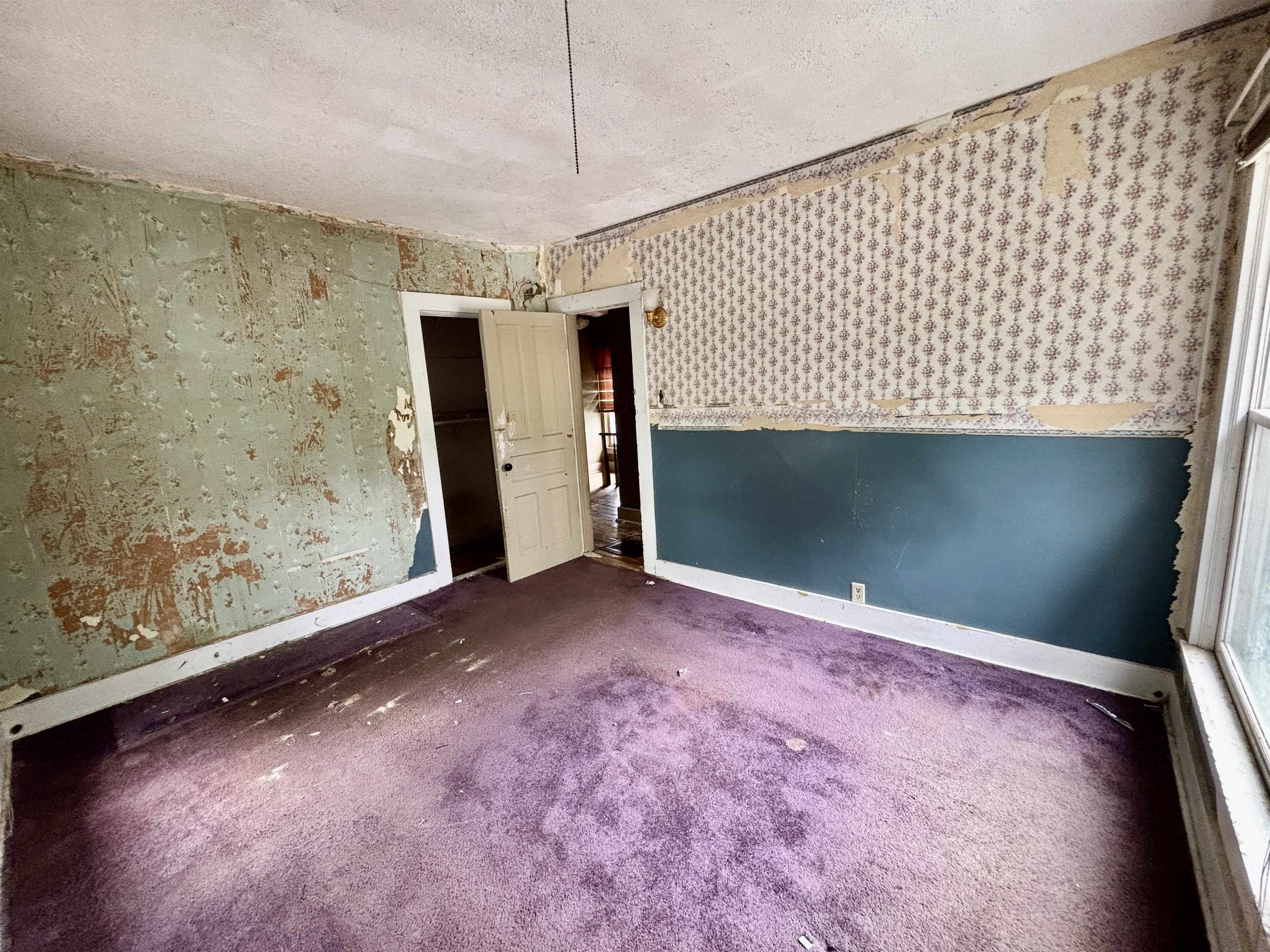 412 West Madison Street Belvidere, IL 61008 - Photo 19 of 27 a view of empty room with window