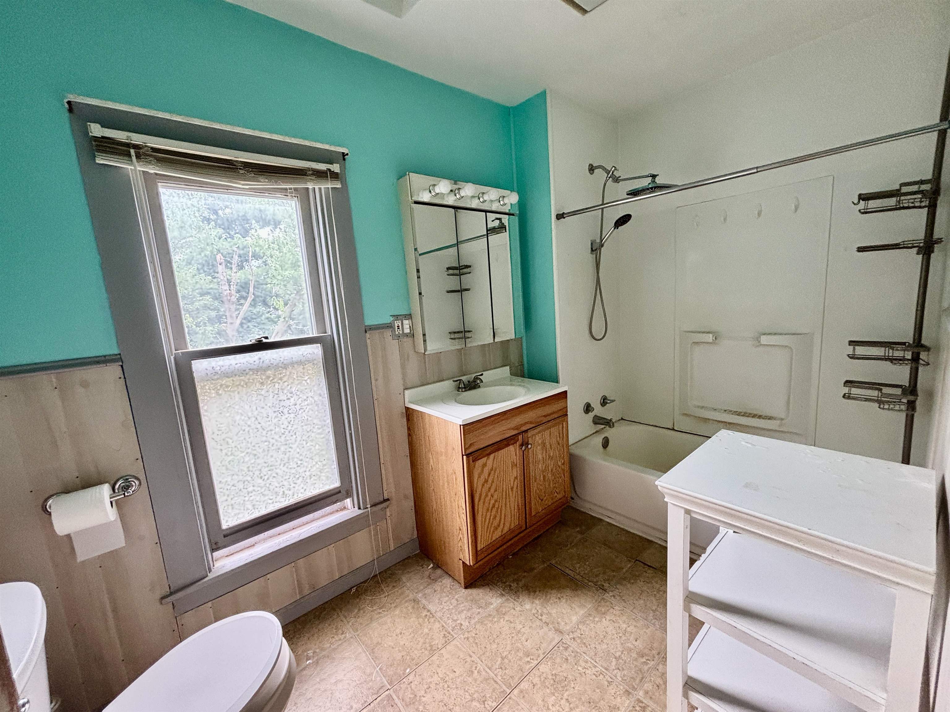 412 West Madison Street Belvidere, IL 61008 - Photo 21 of 27 a room with a washer dryer and a large window