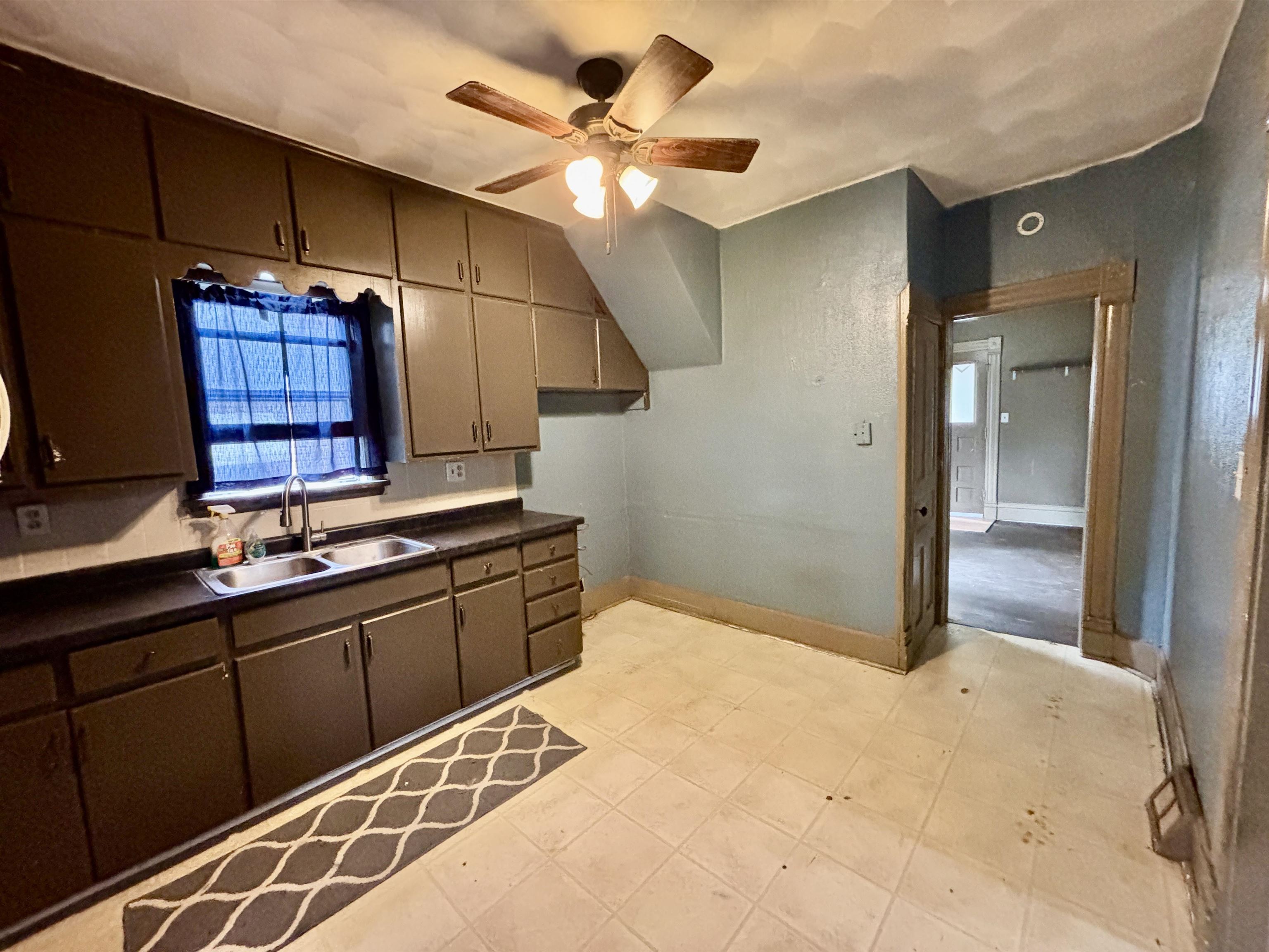 412 West Madison Street Belvidere, IL 61008 - Photo 9 of 27 a view of a kitchen with a sink and cabinets