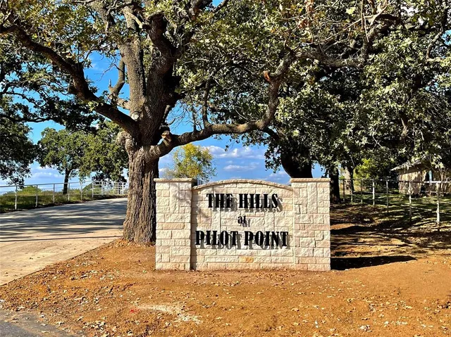 a sign on the side of a road
