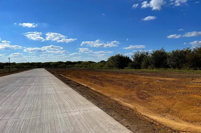 a view of outside space and a yard