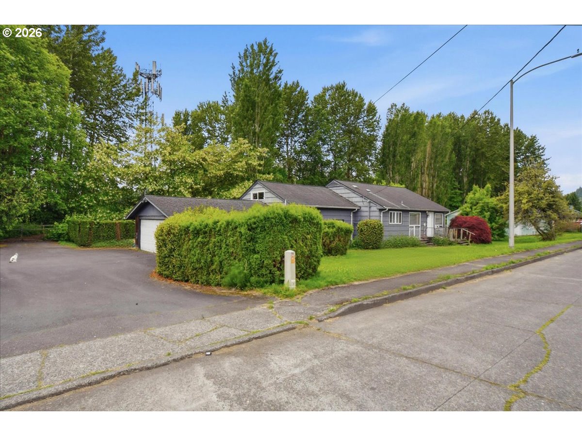 3287 Olive Way Longview, WA 98632 - Photo 23 of 24 a view of a house with a yard