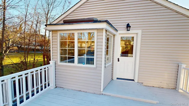 a front view of a house with a porch