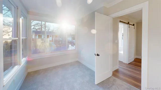 a view of entryway with bathroom