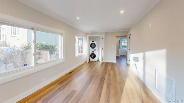 a view of livingroom with furniture wooden floor and window