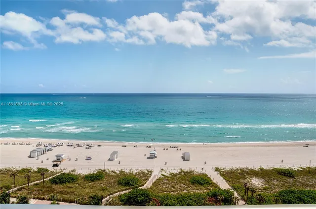 a bedroom with two bed and a window