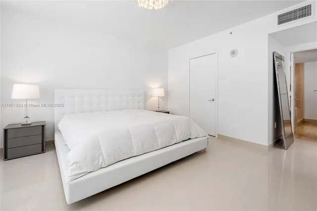 a view of walk in closet with cabinet