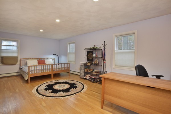 15 Montclair Road Newton, MA 02468 - Photo 9 of 12 a living room with furniture and a wooden floor