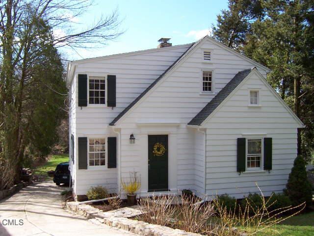 58 Old Road Westport, CT 06880 - Photo 1 of 1 a front view of a house with a porch