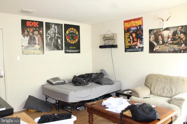 a living room with furniture and rug