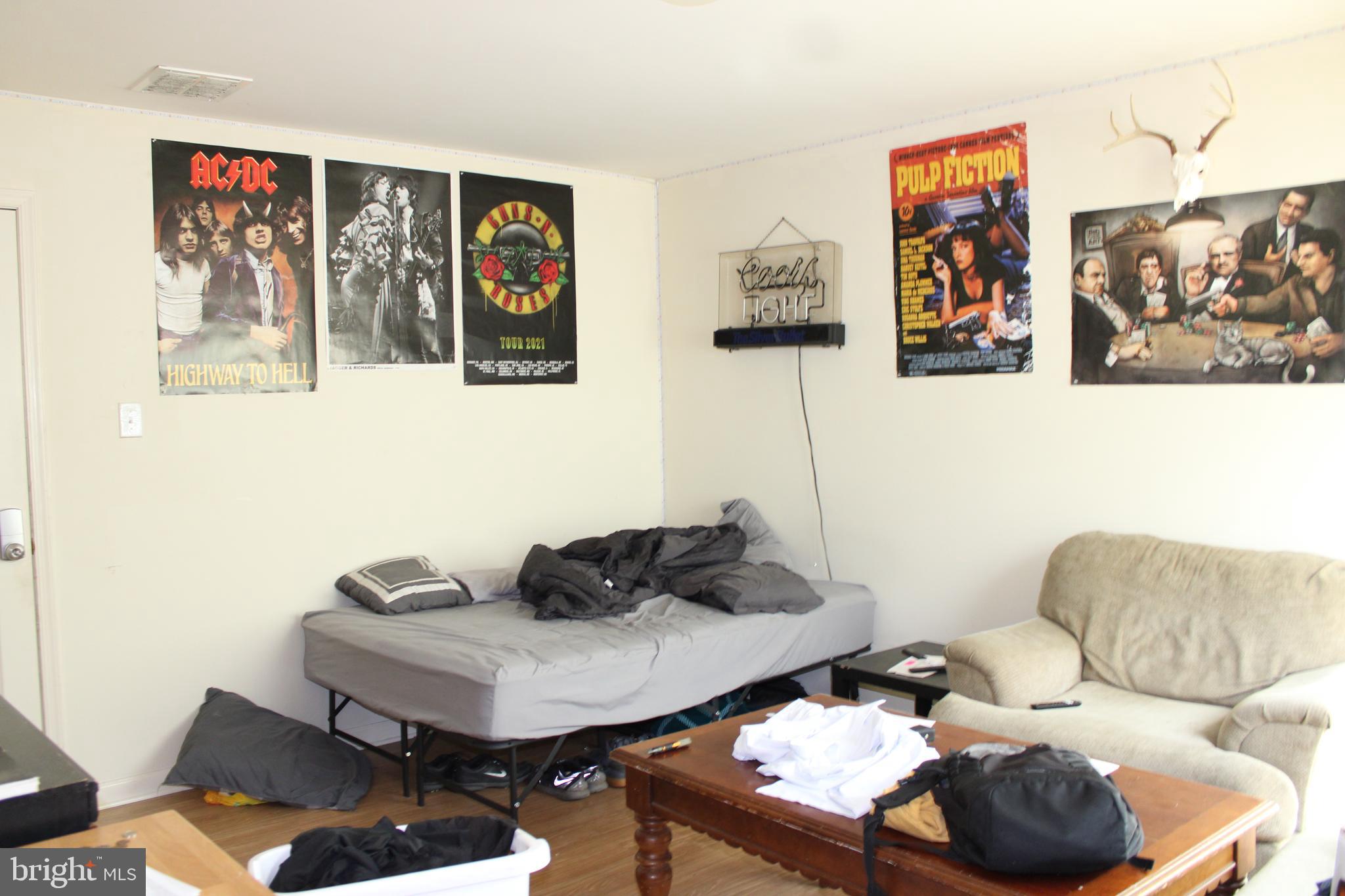 107 Ellis Street Glassboro, NJ 08028 - Photo 6 of 16 a living room with furniture and rug