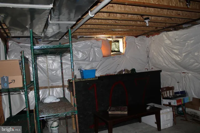 a view of a living room with furniture