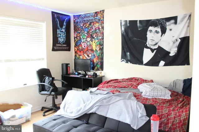 a bedroom with a bed and furniture