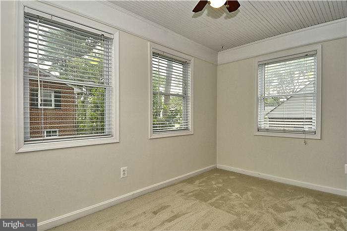 505 Lanark Way Silver Spring, MD 20901 - Photo 9 of 30 a view of an empty room with a window