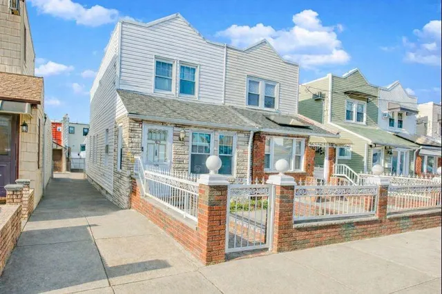 a front view of a house with a porch