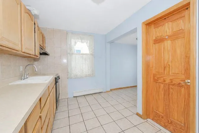 a bathroom with a sink and a bathtub