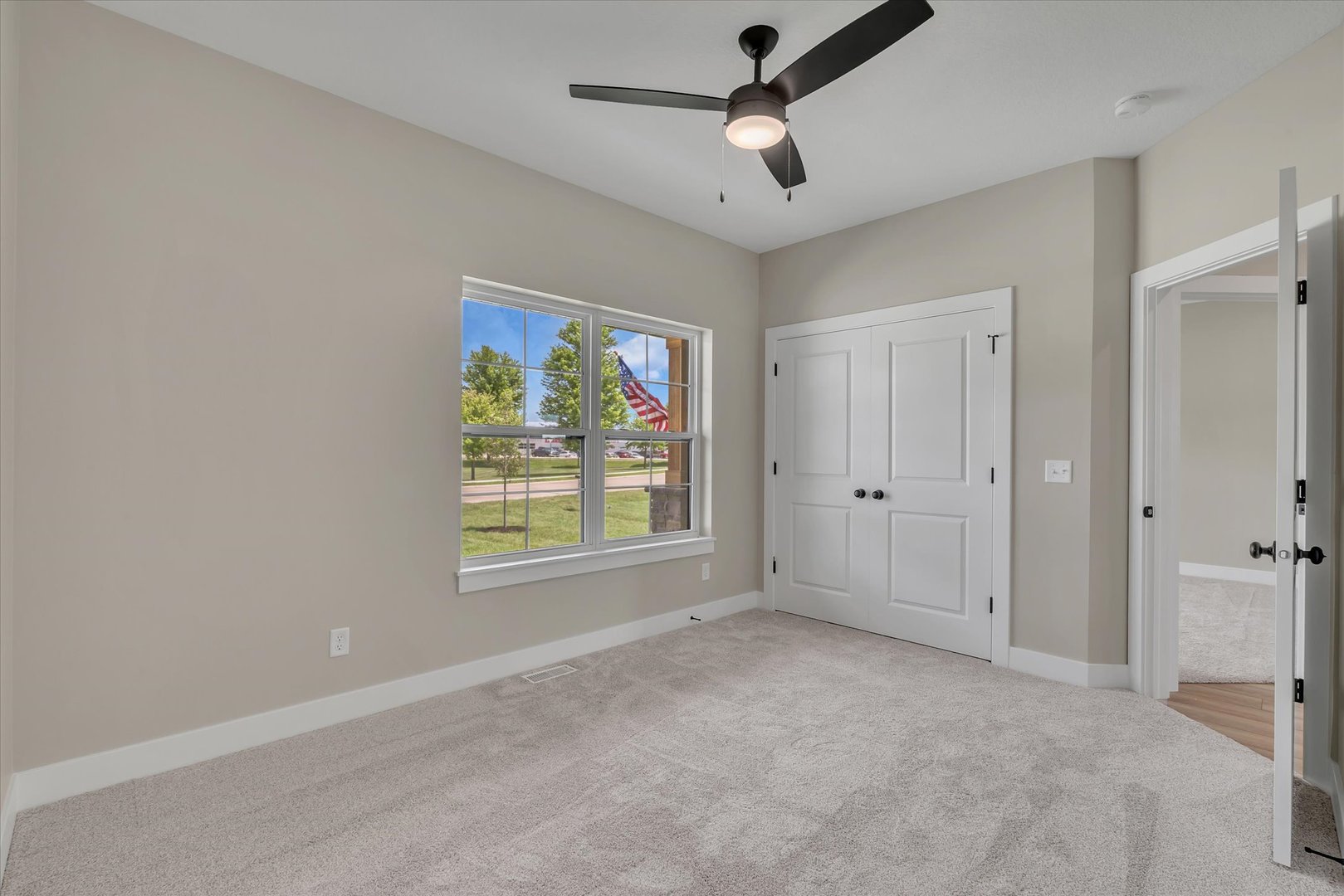 455 Rhonda Road New Liberty, IA 52765 - Photo 47 of 54 a view of an empty room with a window