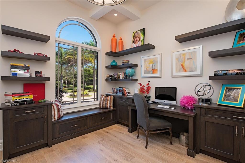 16044 Trebbio Way Naples, FL 34110 - Photo 15 of 33 a livingroom with workspace and a window