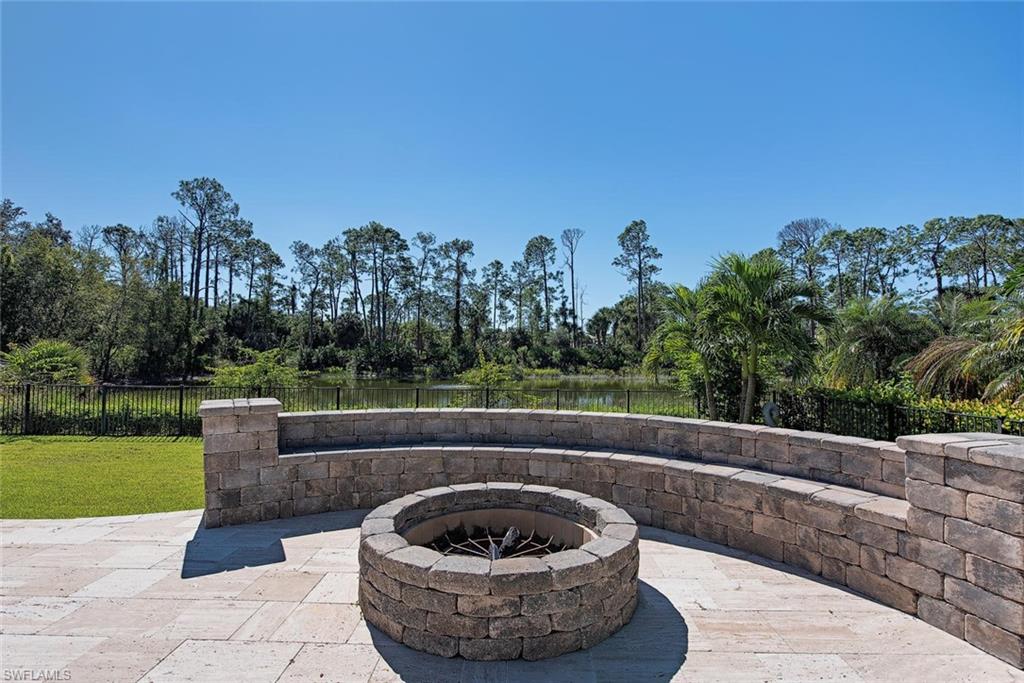16044 Trebbio Way Naples, FL 34110 - Photo 17 of 33 a view of a couches in a patio with a yard