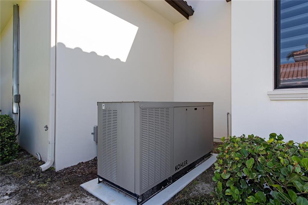 16044 Trebbio Way Naples, FL 34110 - Photo 23 of 33 a view of a storage & utility room