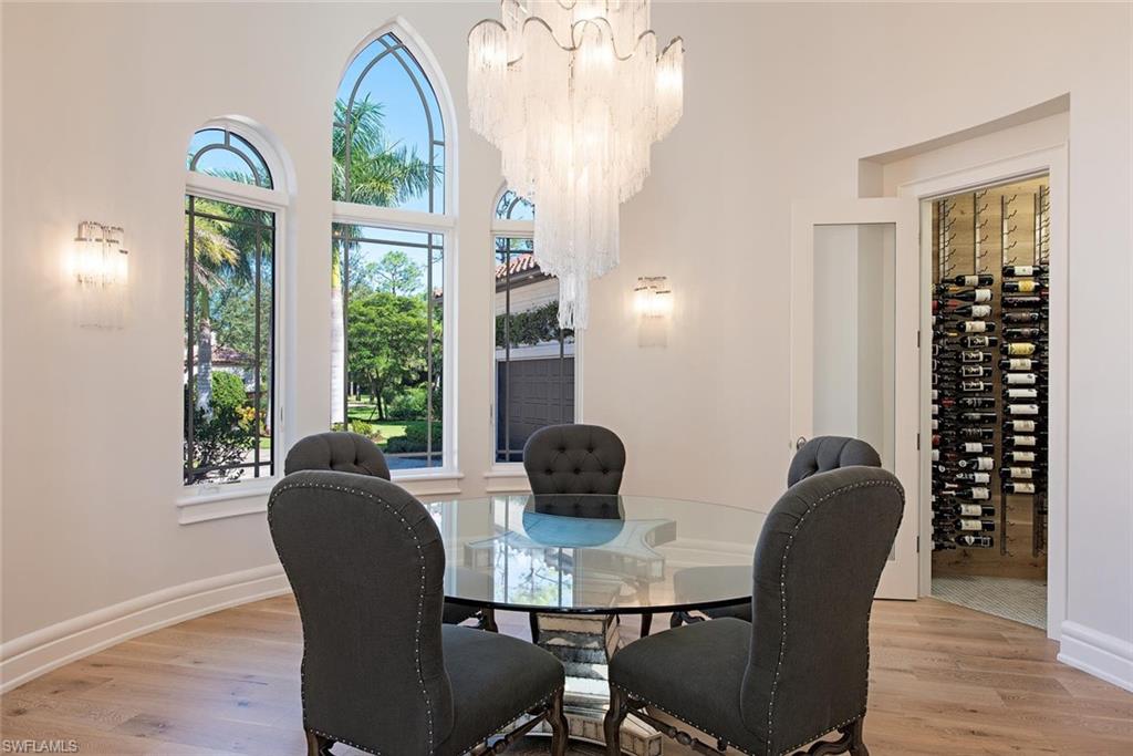 16044 Trebbio Way Naples, FL 34110 - Photo 8 of 33 a dining room with furniture and window