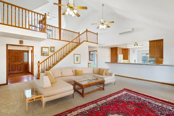 a kitchen with a sink stove and refrigerator