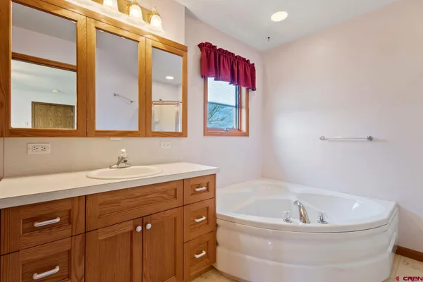 a view of empty room with wooden walls