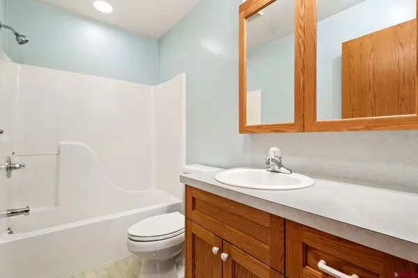 a view of a swimming pool with a lake view