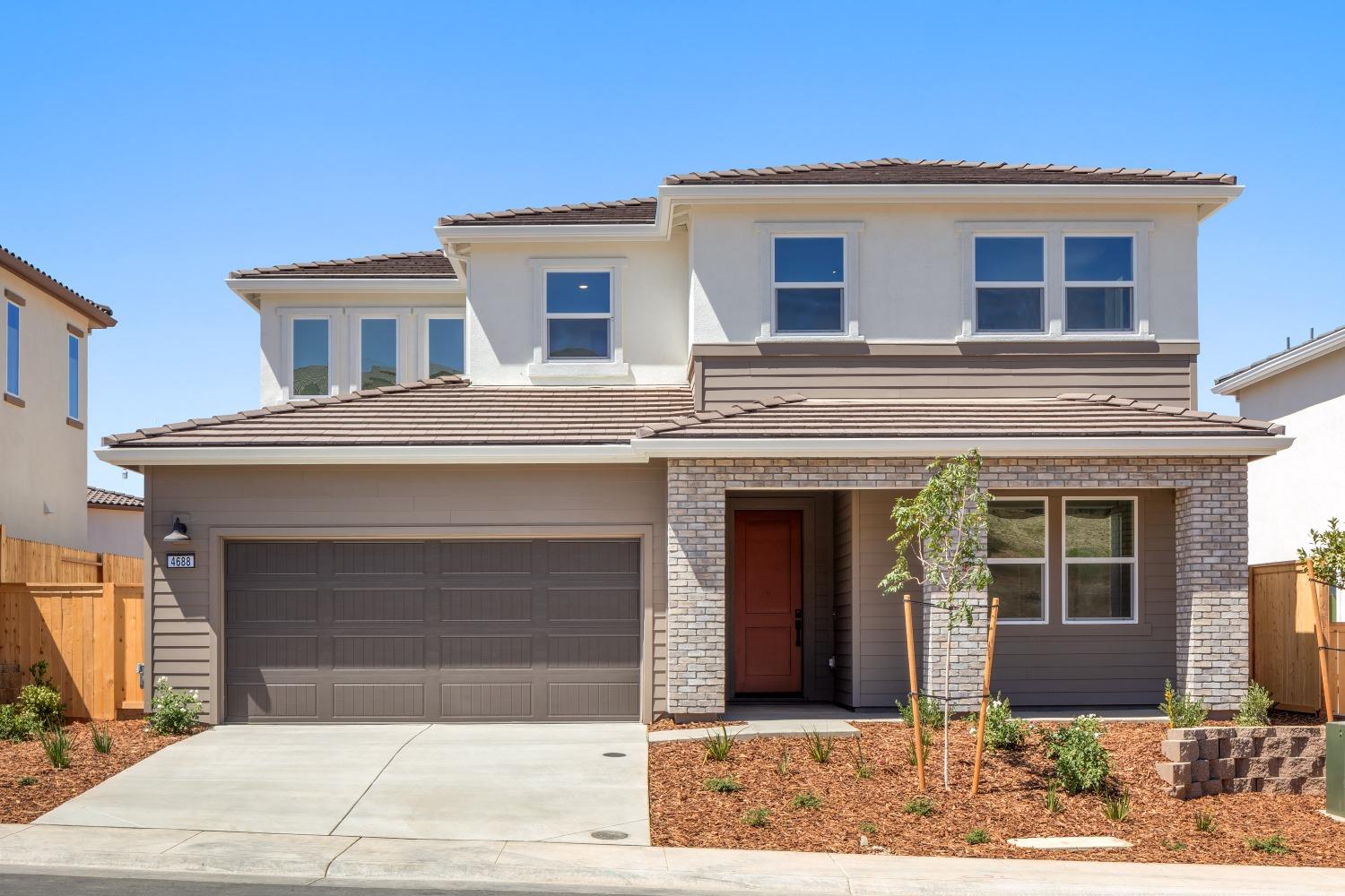 4688 Snapdragon Way Folsom, CA 95630 - Photo 1 of 1 a front view of a house with yard
