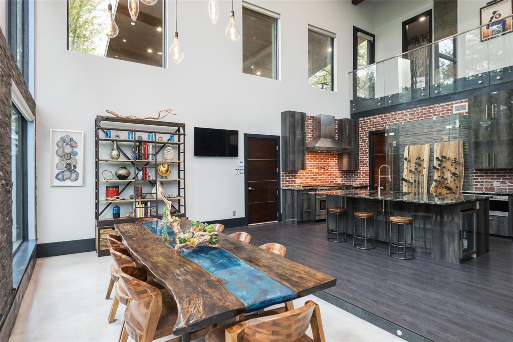 6766 Northaven Road Dallas, TX 75230 - Photo 11 of 40 a living room with furniture pool table and window