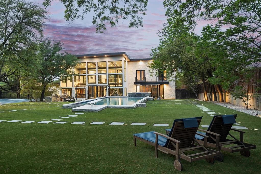 6766 Northaven Road Dallas, TX 75230 - Photo 2 of 40 a view of a house with a yard porch and sitting area