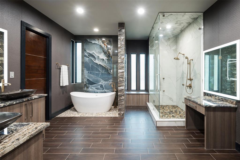 6766 Northaven Road Dallas, TX 75230 - Photo 21 of 40 a spacious bathroom with a large tub shower and sink