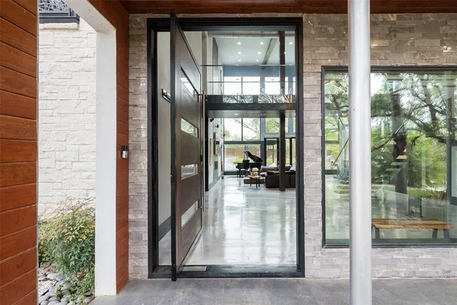 a view of swimming pool and dining room