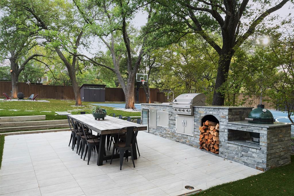 6766 Northaven Road Dallas, TX 75230 - Photo 32 of 40 an outdoor space with furniture and garden