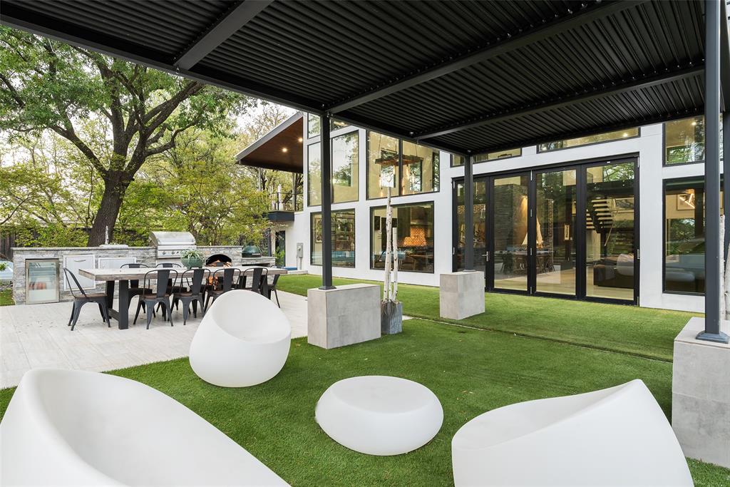 6766 Northaven Road Dallas, TX 75230 - Photo 33 of 40 a view of a dining room with furniture window and outside view