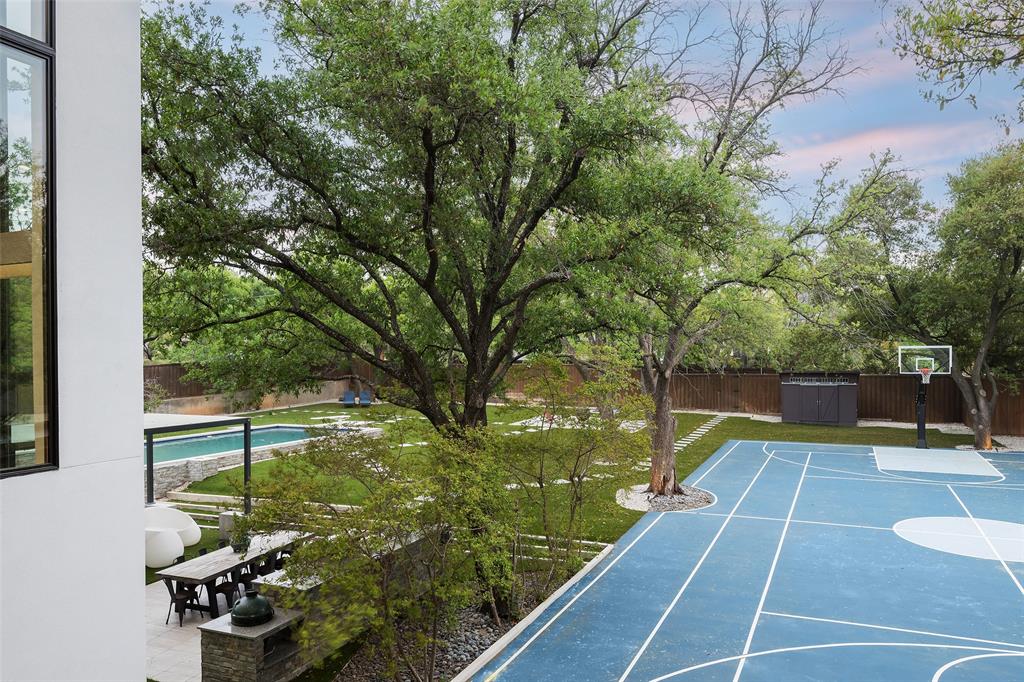 6766 Northaven Road Dallas, TX 75230 - Photo 35 of 40 a view of a backyard