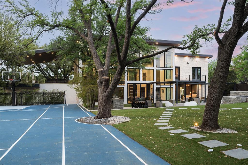 6766 Northaven Road Dallas, TX 75230 - Photo 36 of 40 front view of a house with a yard