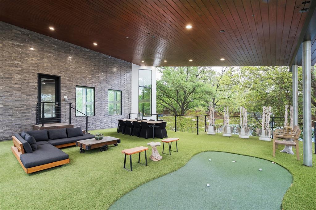 6766 Northaven Road Dallas, TX 75230 - Photo 37 of 40 a living room with furniture and a large window