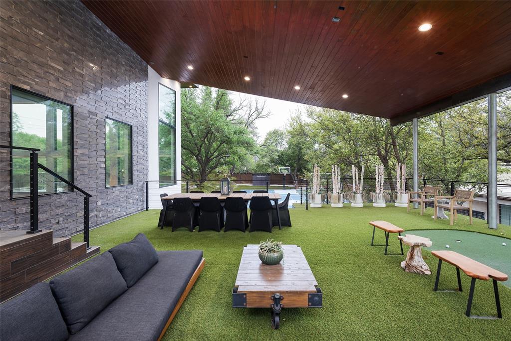 6766 Northaven Road Dallas, TX 75230 - Photo 38 of 40 a view of a patio with couches chairs and a yard