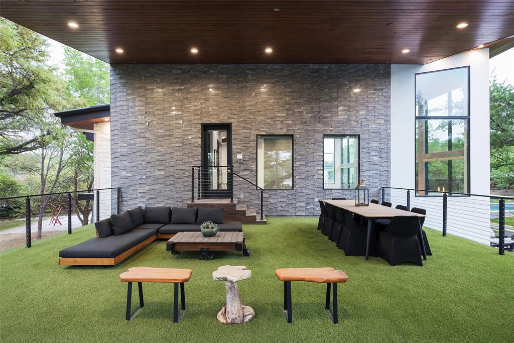 6766 Northaven Road Dallas, TX 75230 - Photo 39 of 40 a living room with furniture and a large window