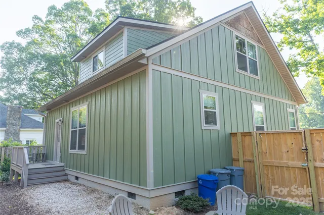 a house view with a garden space