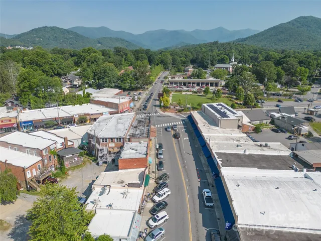 a view of a city with mountain