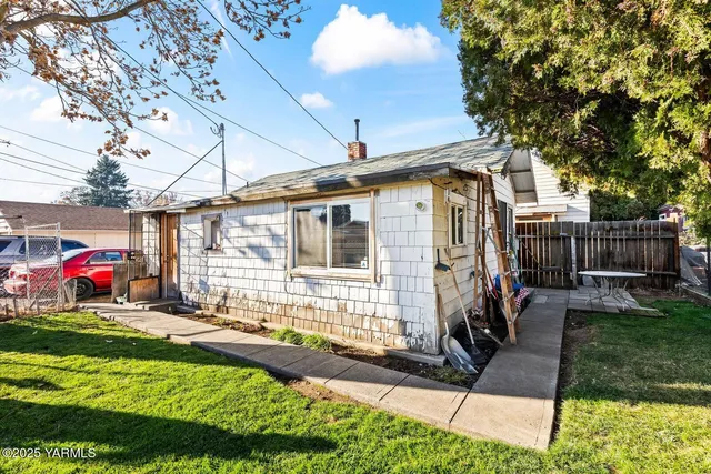 a living room with a rug