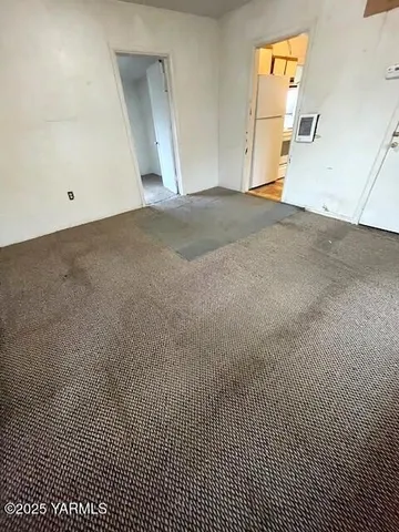 a kitchen with stainless steel appliances granite countertop a sink and a stove