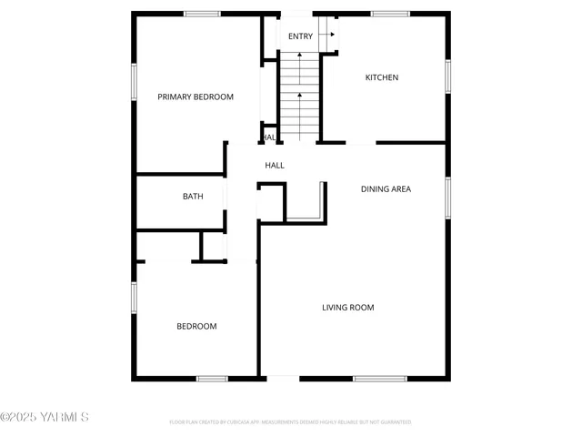 a picture of a bench in front of a wall