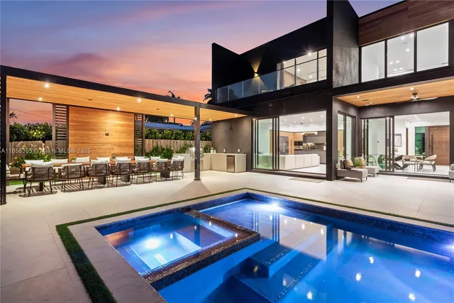 a view of a swimming pool with a patio