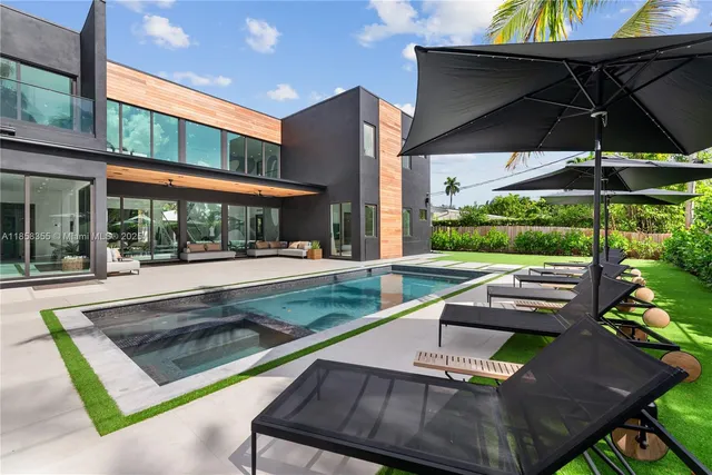 a bedroom with a large bed and a view of bedroom