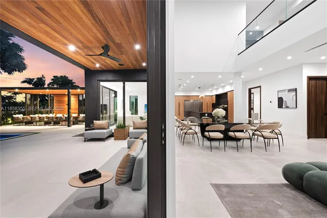 a bedroom with two beds and a couch