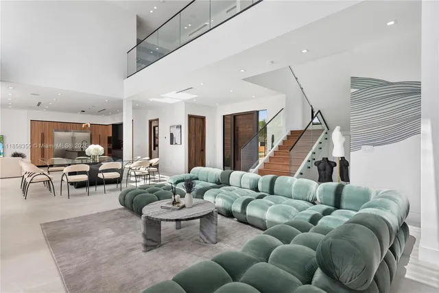 a bedroom with a large bed and a large window