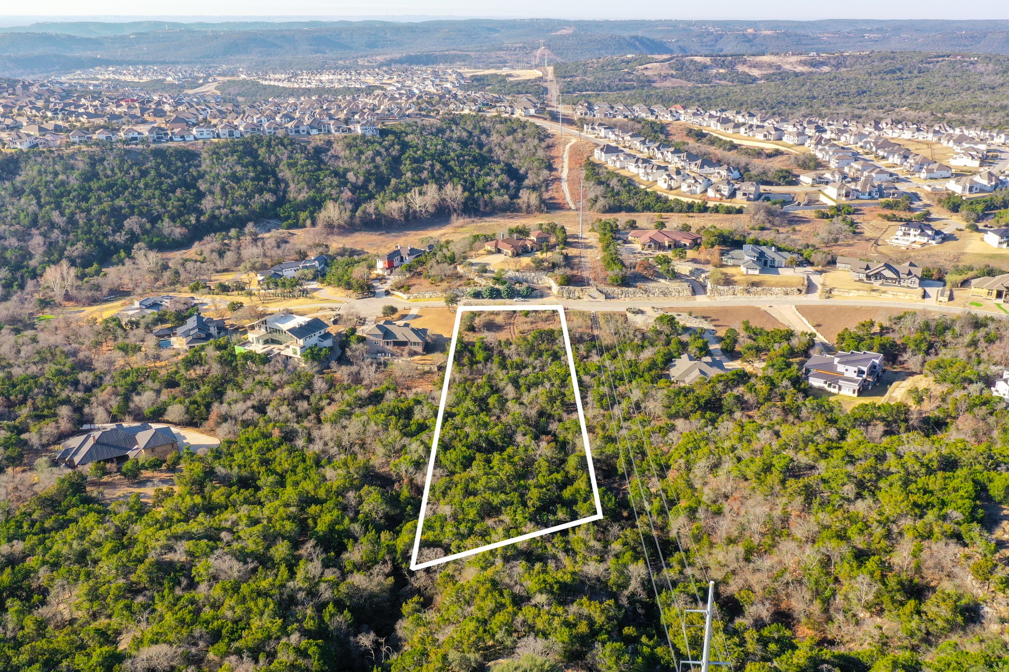 816 Laughing Dog Court Leander, TX 78641 - Photo 2 of 8 Aerial view of residential area with property boundaries highlighted